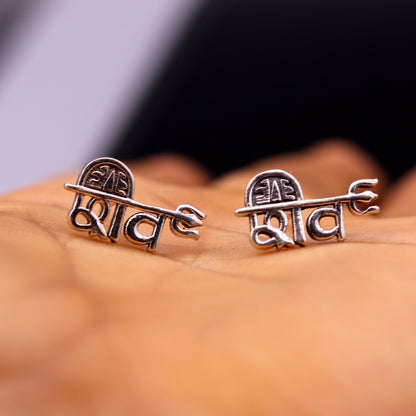 Sterling silver Lord Shiva stud earrings with intricate tribal design, handcrafted unisex ethnic jewelry by Tribal Ornaments.