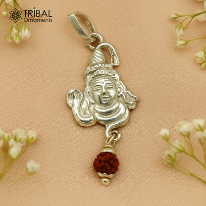 Solid sterling silver Lord Shiva pendant with hanging Rudraksha, featuring detailed Hindu deity design, custom jewelry by TRIBAL ORNAMENTS.