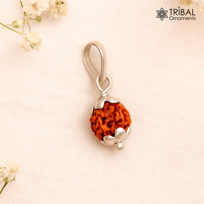 Solid sterling silver Rudraksha pendant, handmade unisex jewelry with intricate tribal design, lightweight and suitable for gifting.