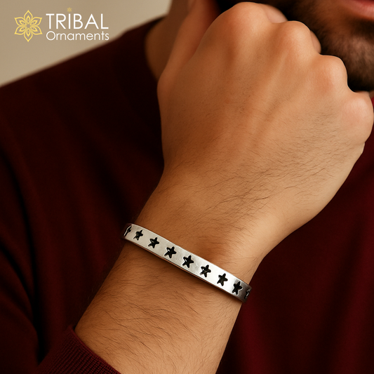 Star Forge 925 sterling silver unisex bangle cuff by Tribal Ornaments, featuring a sleek, modern silver jewelry design.