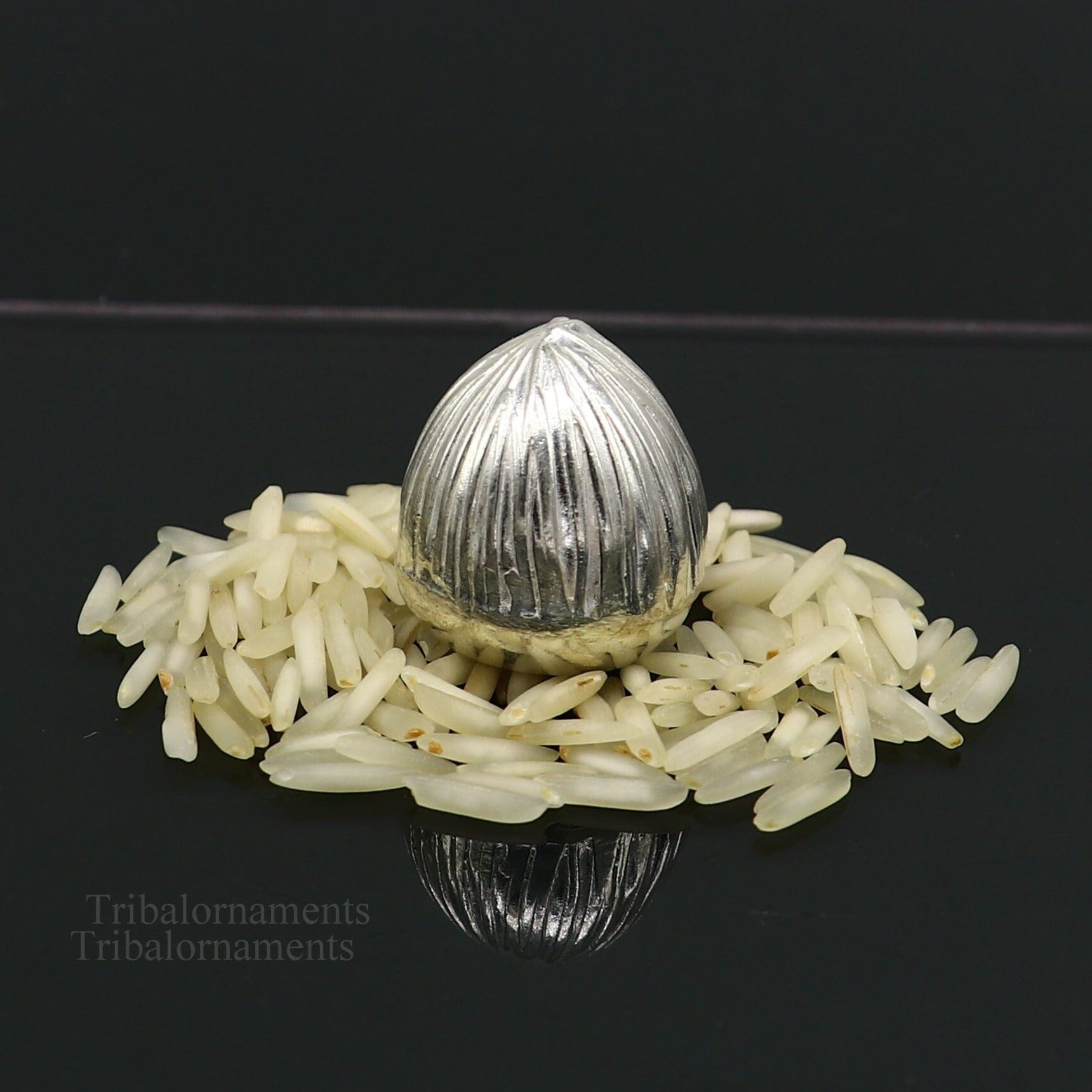 Sterling silver handmade Betal palm tree seed Supari, tribal ornament for puja, crafted by TRIBAL ORNAMENTS.