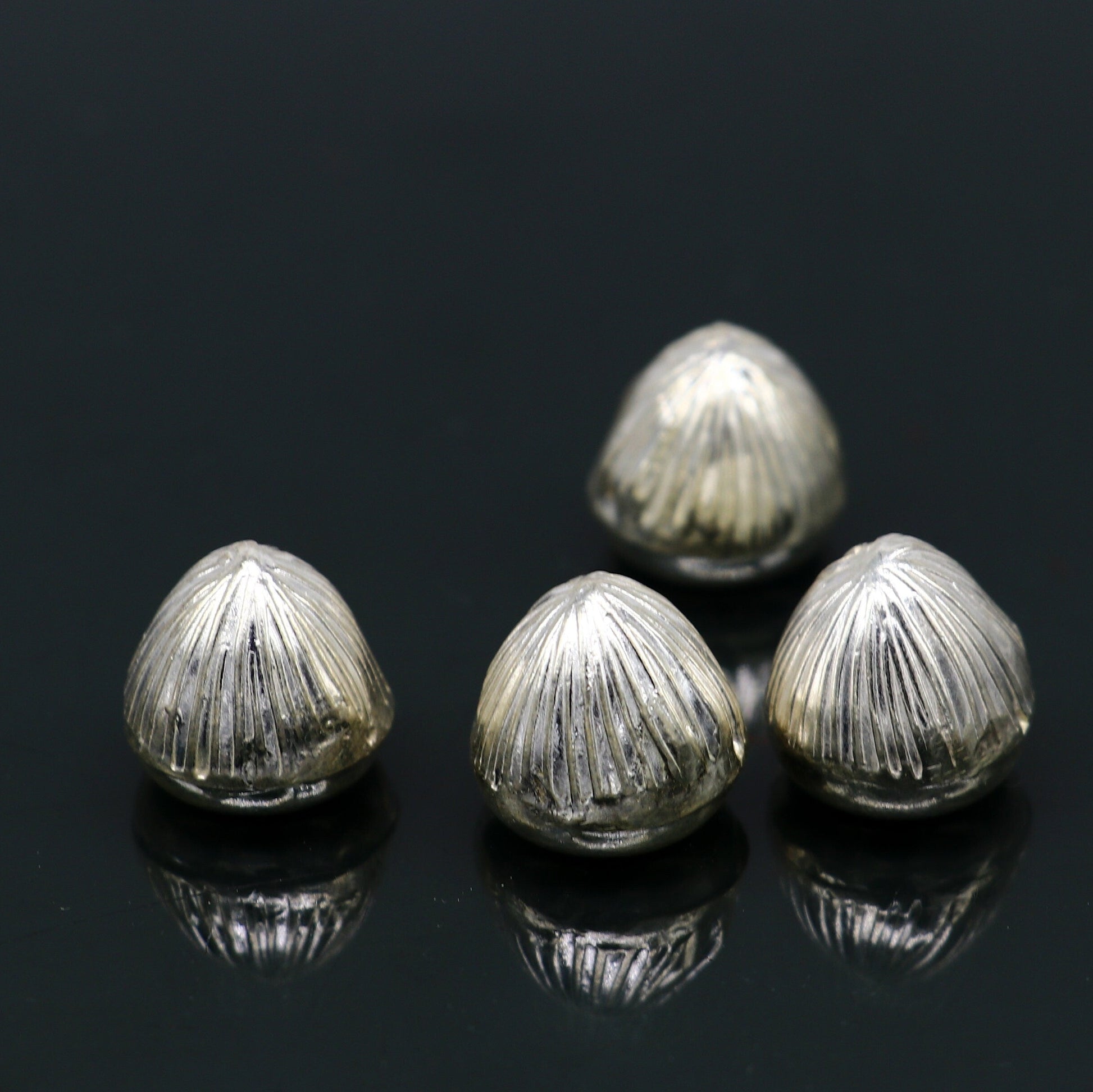Sterling silver handmade Betal palm tree seed Supari, puja article, tribal ornament for worship and spiritual rituals.
