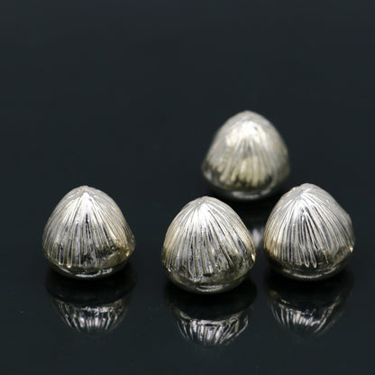 Sterling silver handmade Betal palm tree seed Supari, puja article, tribal ornament for worship and spiritual rituals.