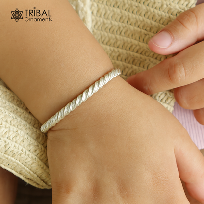 Sterling silver adjustable baby bangle bracelet by Tribal Ornaments, unisex handmade solid silver jewelry for kids.
