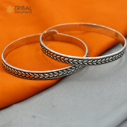 Trendy cultural design 925 sterling silver bangle bracelet from TRIBAL ORNAMENTS, featuring handmade unique wedding jewelry for brides