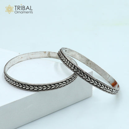 Trendy cultural design 925 sterling silver bangle bracelet from TRIBAL ORNAMENTS, featuring intricate handmade wedding jewelry style.