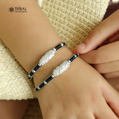 Sterling silver baby bangle with black evil eye design, Tribal Ornaments baby jewelry for newborns and kids, Indian-inspired style.