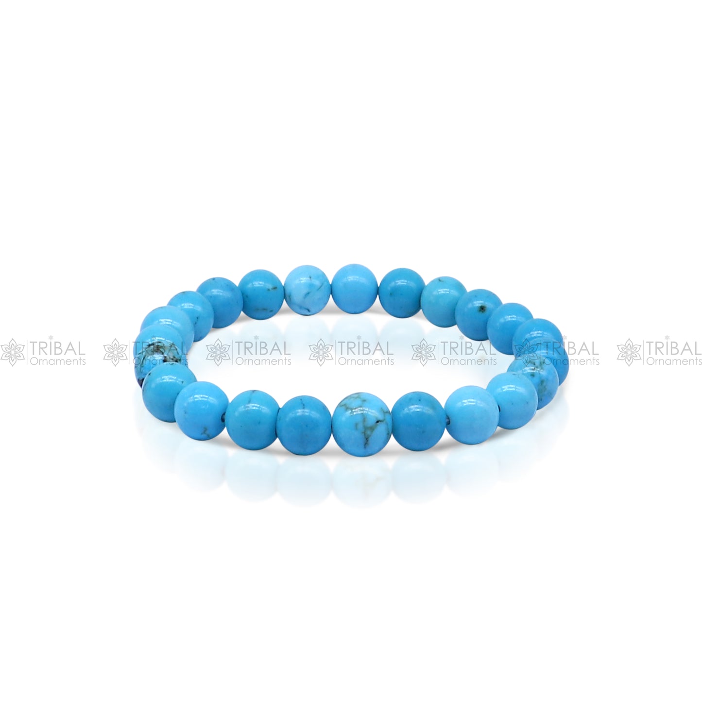 Turquoise crystal bracelet by TRIBAL ORNAMENTS featuring vibrant beads, showcasing its protective and healing properties.