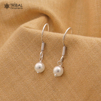 Sterling silver hoop earrings with pearl stones, lightweight and stylish, featuring delicate and elegant jewelry design by Tribal Ornaments.