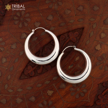 Vintage tribal kundal hoop earring made of 925 sterling silver from Rajasthan, India, featuring intricate traditional design.