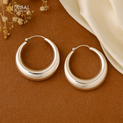 Vintage tribal kundal earrings from Rajasthan in 925 sterling silver, featuring bold hoop design and intricate craftsmanship.
