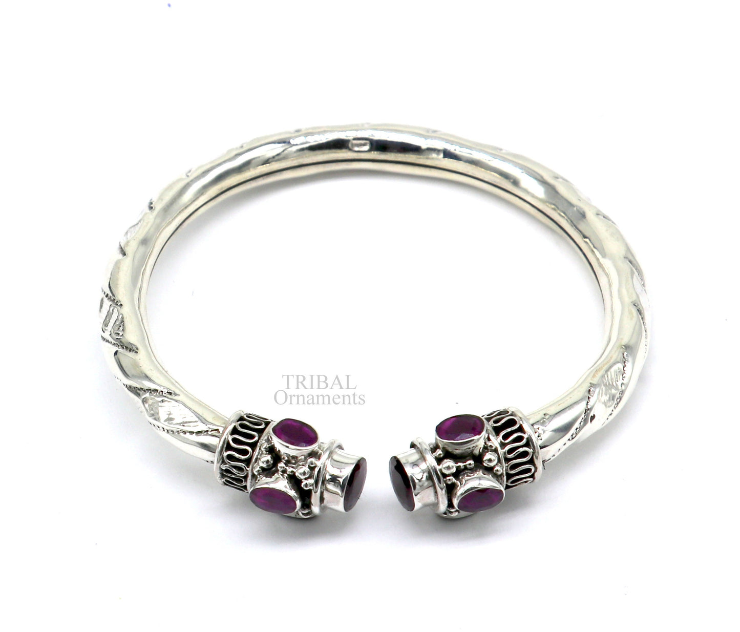Vintage tribal-style 925 sterling silver stone bangle cuff bracelet, adjustable by twisting, with intricate tribal jewelry design.