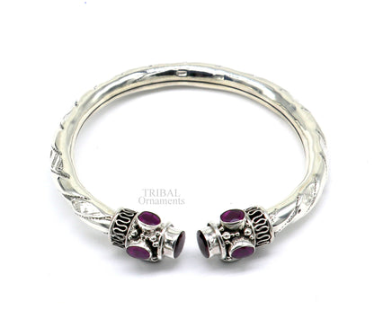 Vintage tribal-style 925 sterling silver stone bangle cuff bracelet, adjustable by twisting, with intricate tribal jewelry design.