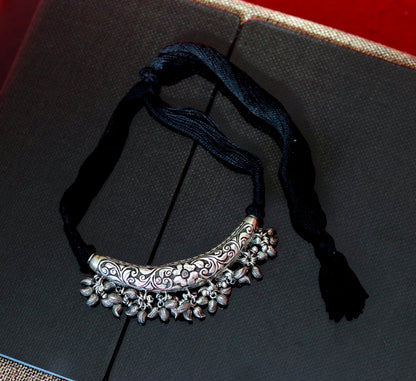 Vintage Indian tribal silver charm necklace with customized chitai and kandrai work, featuring traditional sterling silver jewelry set.