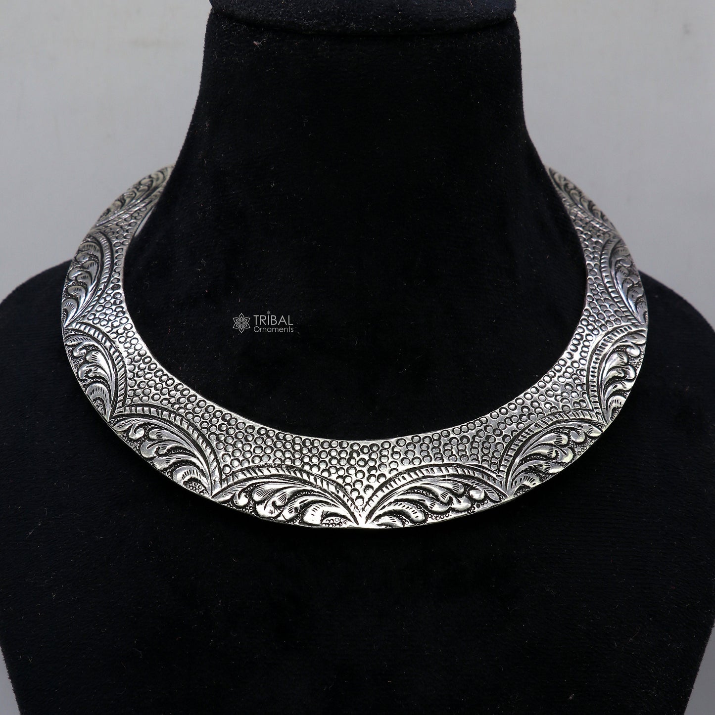 Vintage Indian tribal-style silver choker necklace with customized chitai and kandrai work, part of a traditional jewelry set.