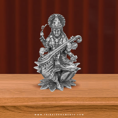 Small 2-inch handmade 925 Sterling silver Hindu idols of Lakshmi, Ganesha, and Saraswati for puja rituals, detailed religious figurines.