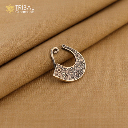 Sterling silver tribal nose pin with vintage design, clip-on ethnic jewelry by Tribal Ornaments, featuring intricate tribal motifs.
