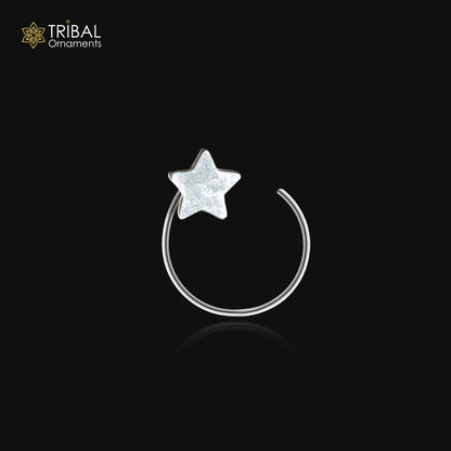 Sterling silver nose pin with star design and U-band tribal pattern, crafted by Tribal Ornaments.