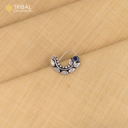 Sterling silver vintage leaf-shaped nose pin with pearl and stone accents, tribal ornamental jewelry design.