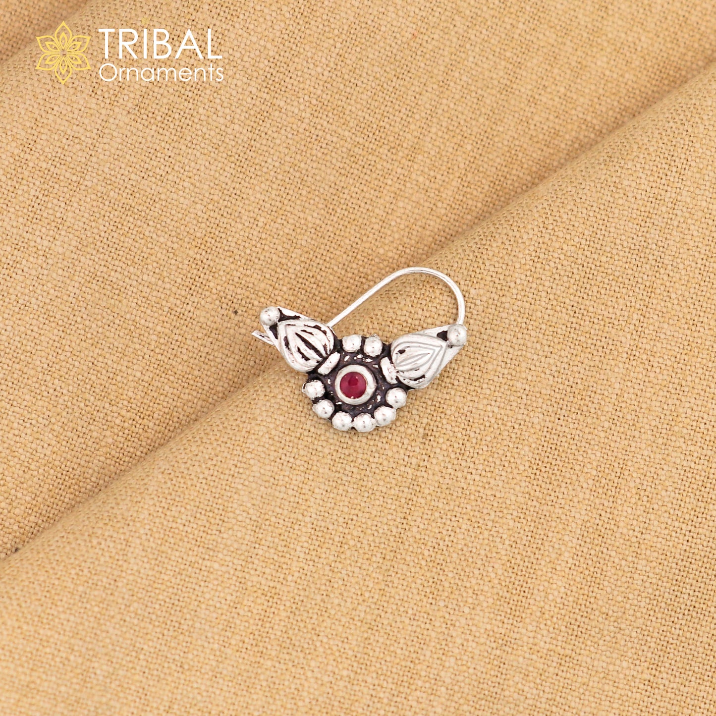 Sterling silver vintage round design nose pin with red stone from Tribal Ornaments, showcasing ethnic tribal jewelry style.