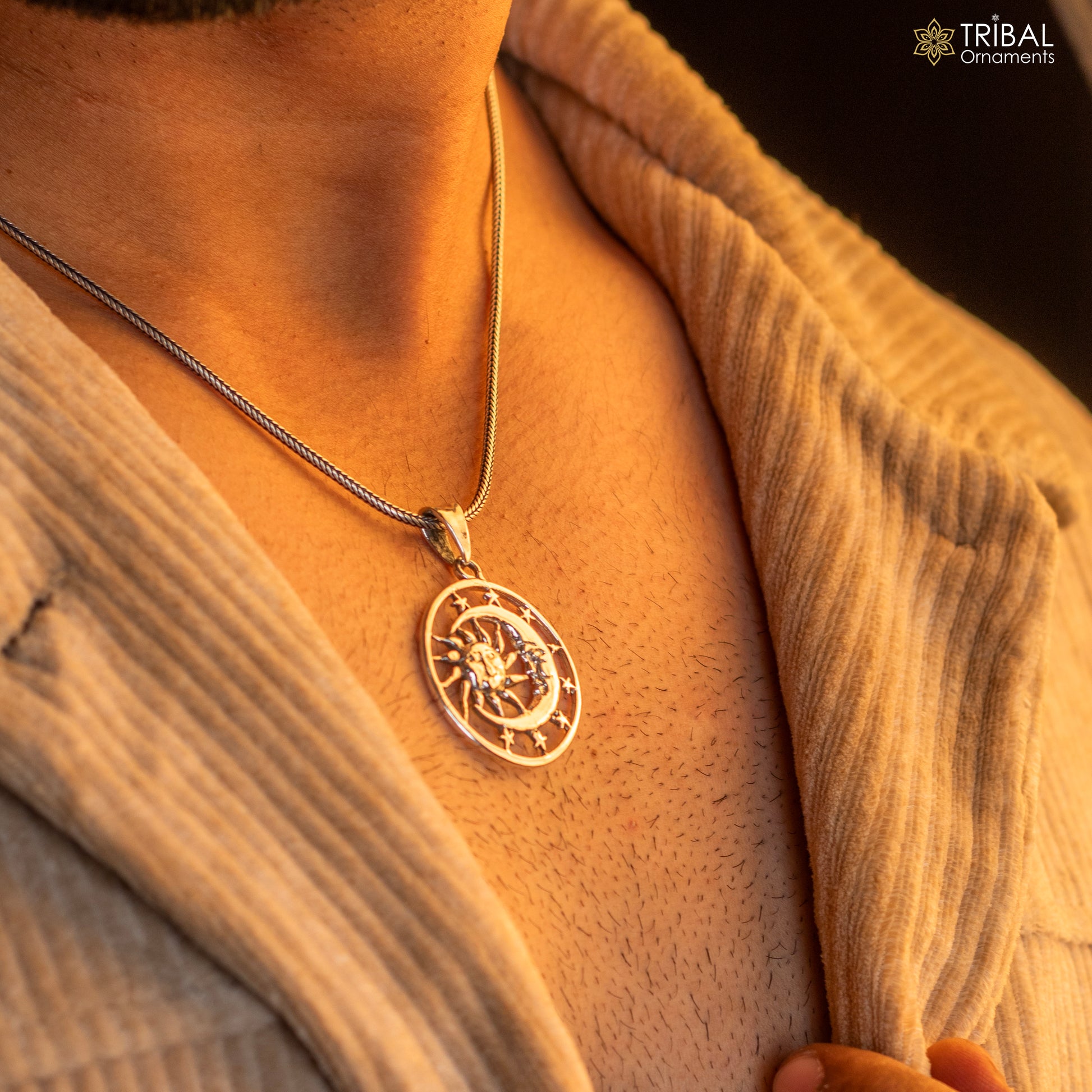 Sterling silver sun, moon, and star pendant by TRIBAL ORNAMENTS, unisex handmade jewelry with a stylish celestial design.