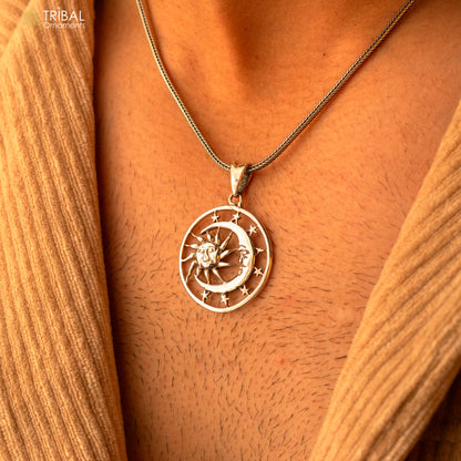 Sterling silver sun, moon, and star pendant by TRIBAL ORNAMENTS, unisex handmade jewelry with intricate celestial design.