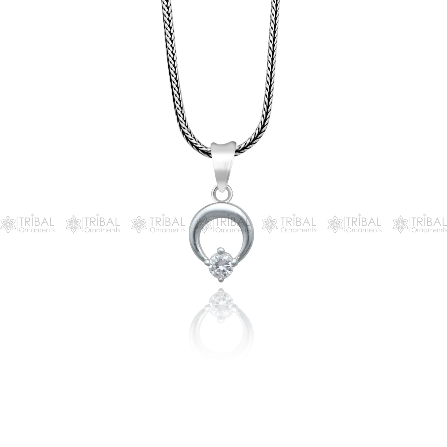 925 Sterling silver antique diamond pendant with tribal design, featuring intricate craftsmanship and sparkling diamond accents.