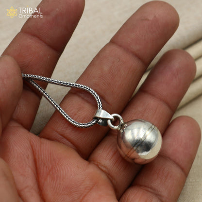 Sterling silver cat jingling pendant with ball design, tribal jewelry by TRIBAL ORNAMENTS, featuring intricate tribal-style details.