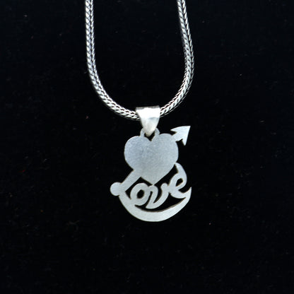 925 Sterling silver pendant with diamond heart and love design from TRIBAL ORNAMENTS, showcasing intricate craftsmanship and sparkling accents.