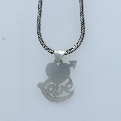 925 Sterling silver pendant featuring a diamond heart and love design, crafted by TRIBAL ORNAMENTS.