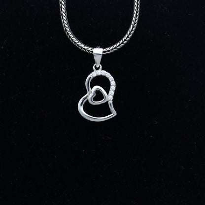 925 Sterling silver heart-shaped pendant with diamond accents from Tribal Ornaments, featuring a delicate and elegant design.
