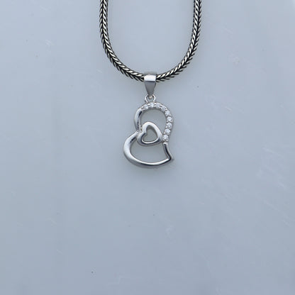 925 Sterling silver diamond heart pendant from TRIBAL ORNAMENTS featuring a delicate heart design and sparkling diamonds.