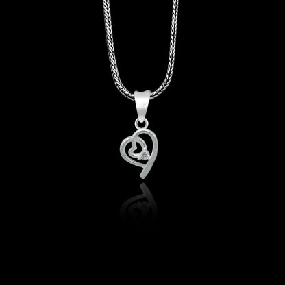 925 Sterling silver diamond heart pendant with tribal ornament design, featuring intricate craftsmanship and sparkling diamond accents.