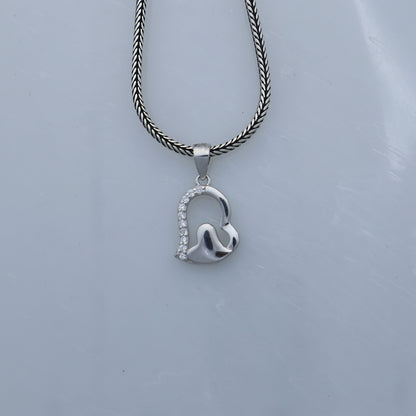 925 Sterling silver diamond heart pendant with tribal ornament design, featuring intricate craftsmanship and sparkling gemstone accents.