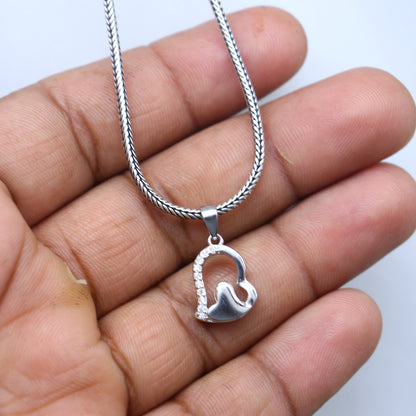 925 Sterling silver diamond heart pendant by TRIBAL ORNAMENTS, featuring a delicate heart design with sparkling diamonds.