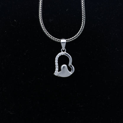 925 Sterling silver heart-shaped pendant with diamond accents from Tribal Ornaments, featuring a delicate and elegant design.