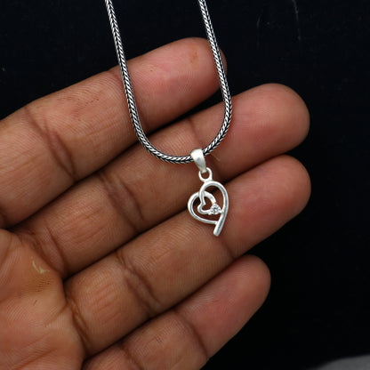 925 Sterling silver diamond heart pendant by TRIBAL ORNAMENTS with intricate heart design and sparkling diamond accents.