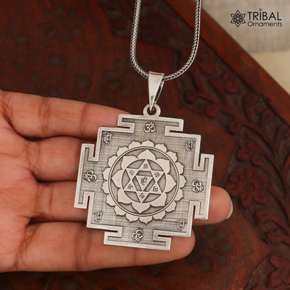 Sterling silver Divine Baglamukhi Maha Yantram pendant by TRIBAL ORNAMENTS, featuring intricate design and energetic Kavacham symbol.