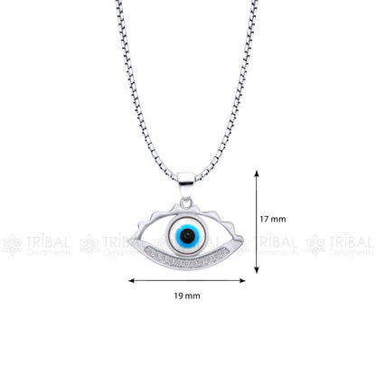 925 sterling silver evil eyes pendant with CZ stone from TRIBAL ORNAMENTS, featuring detailed tribal design and eye-shaped charm