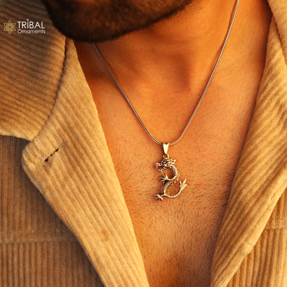 Sterling silver vintage dragon pendant by TRIBAL ORNAMENTS, stylish jewelry for boys and girls featuring intricate tribal design.