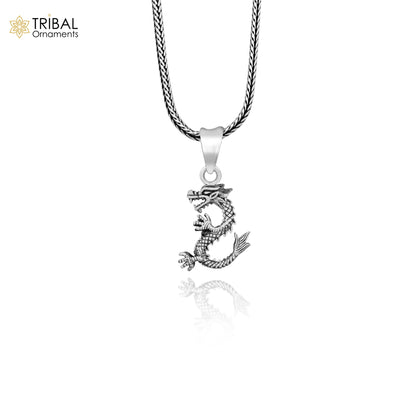 Sterling silver vintage dragon pendant by Tribal Ornaments, featuring detailed tribal design, suitable for boys and girls.