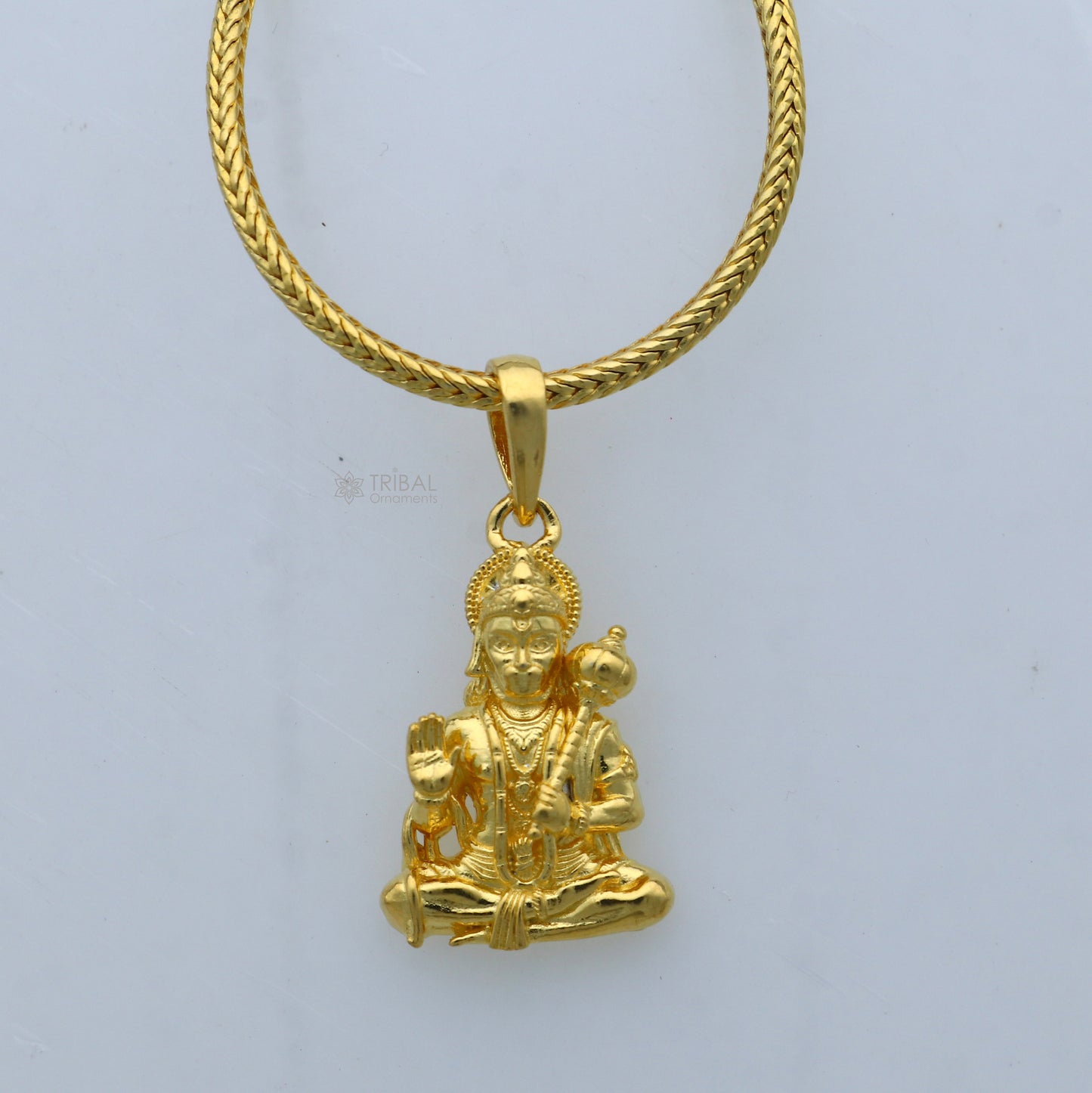 925 sterling silver gold-polished Lord Hanuman ji pendant, divine design, intricate tribal ornaments, detailed religious jewelry.