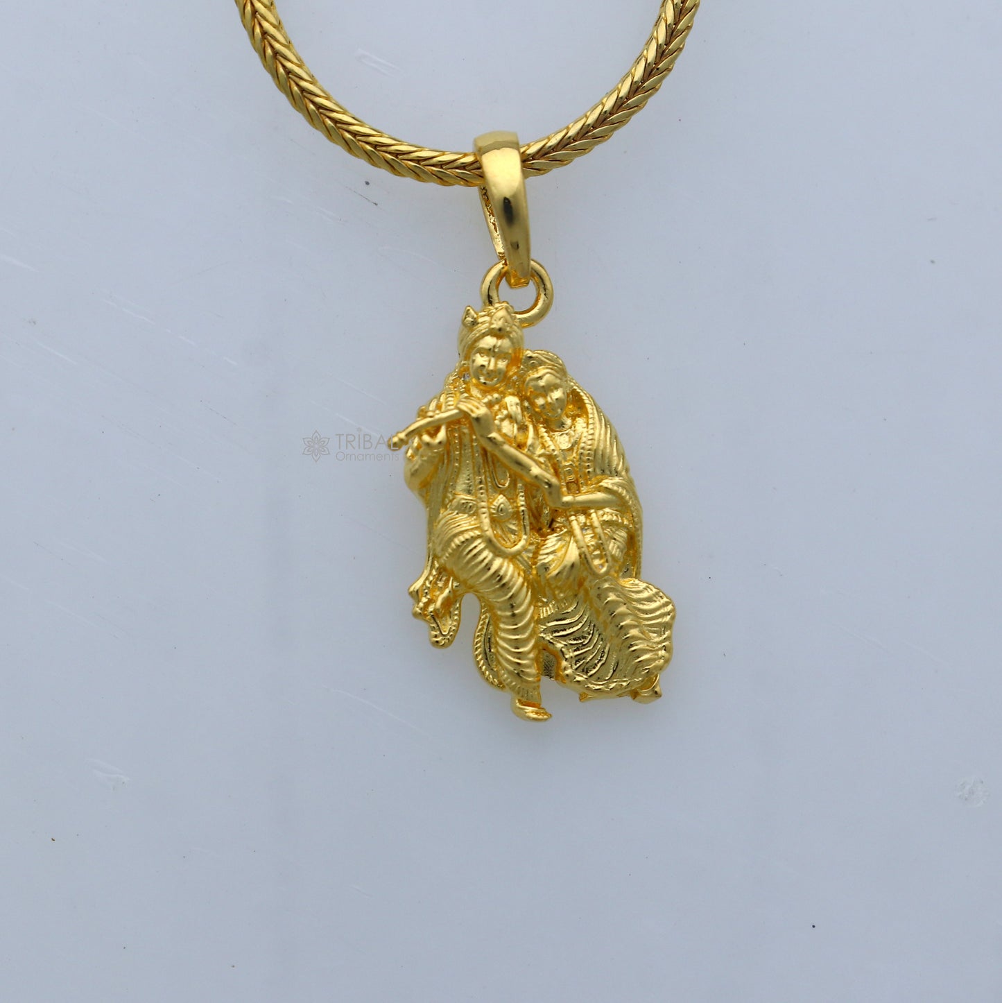 925 sterling silver gold-polished Lord Krishna and Radha divine pendant, intricate tribal ornament design, traditional jewelry piece