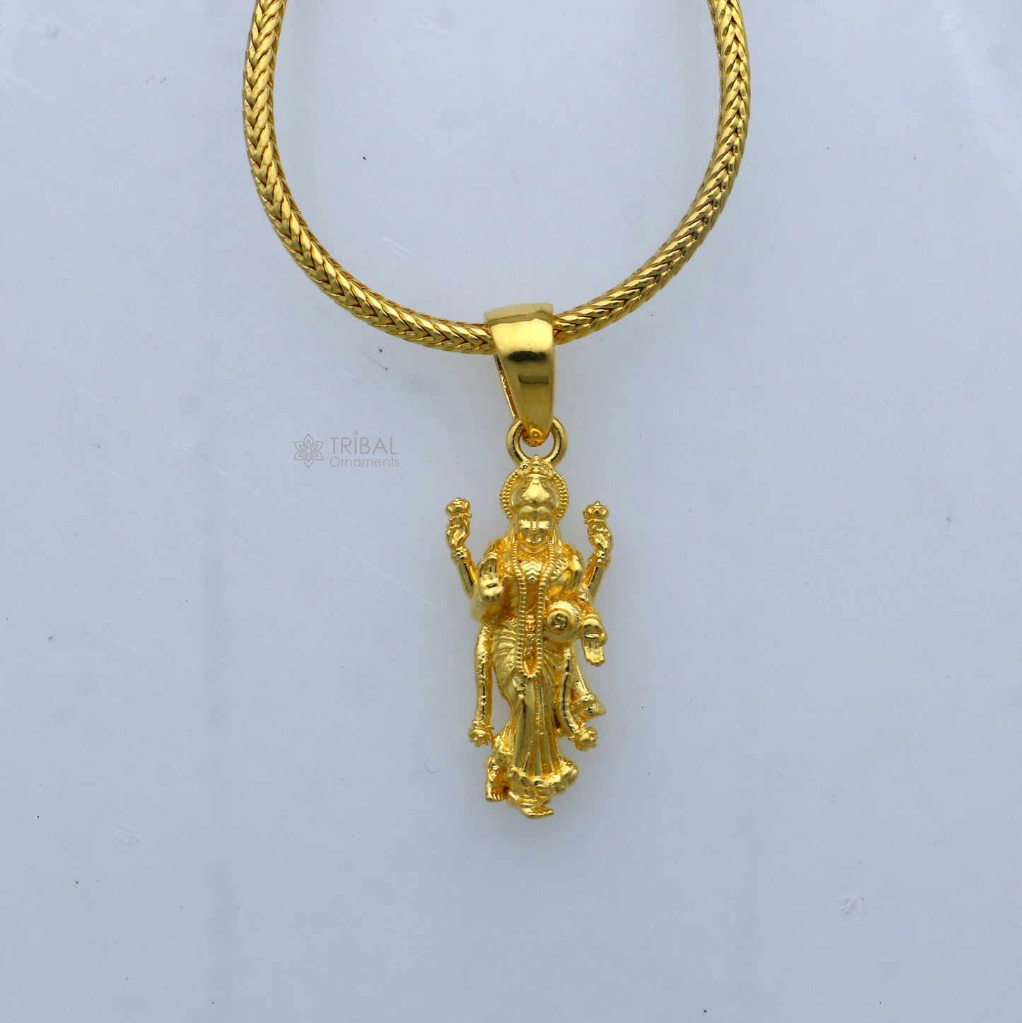 925 sterling silver gold-polished Lord Maha Lakshmi divine pendant by Tribal Ornaments, featuring intricate Maa Lakshmi design.