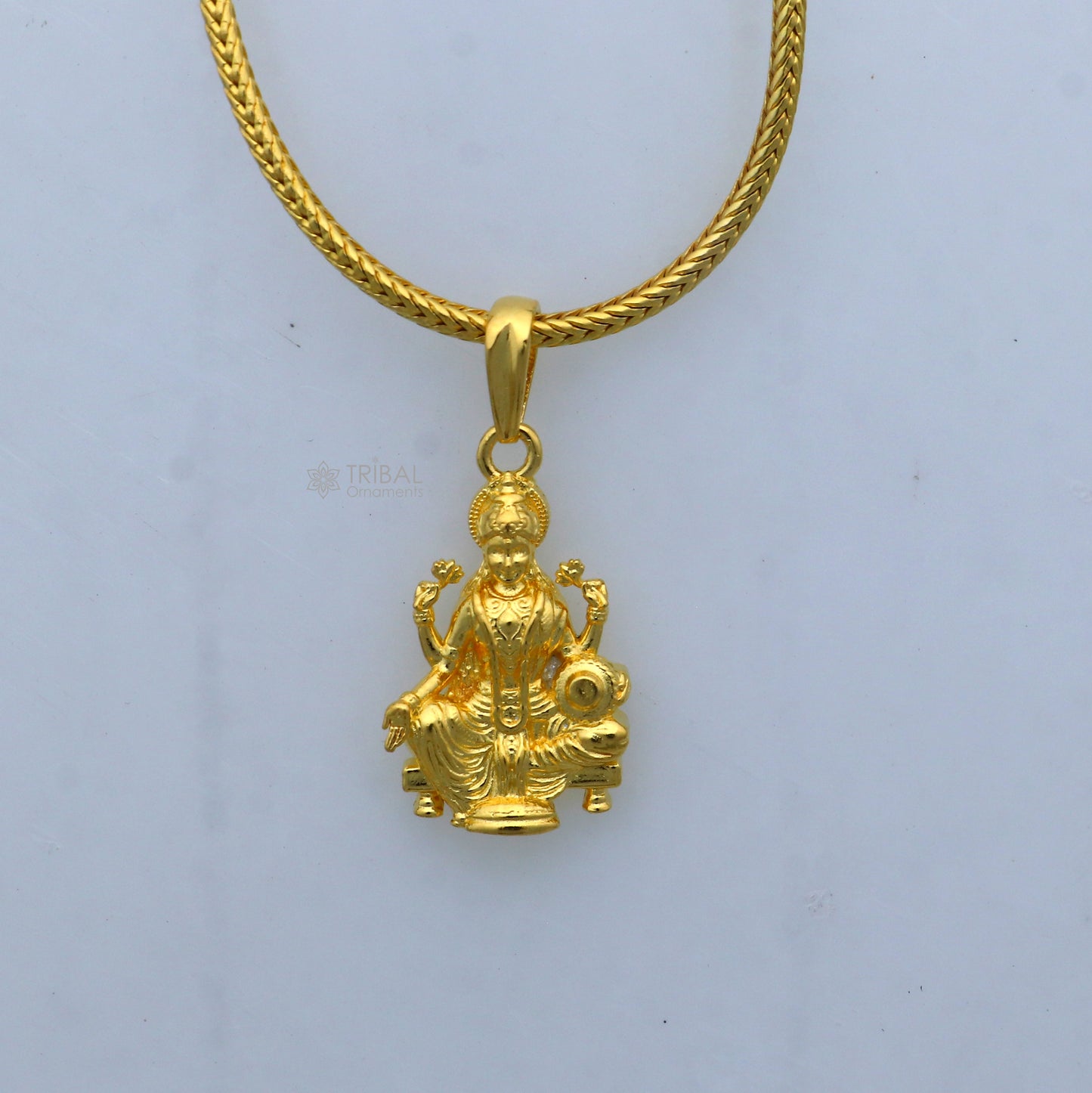 925 sterling silver gold-polished Lord Maha Laxmi Ji pendant with intricate divine design, crafted by TRIBAL ORNAMENTS.