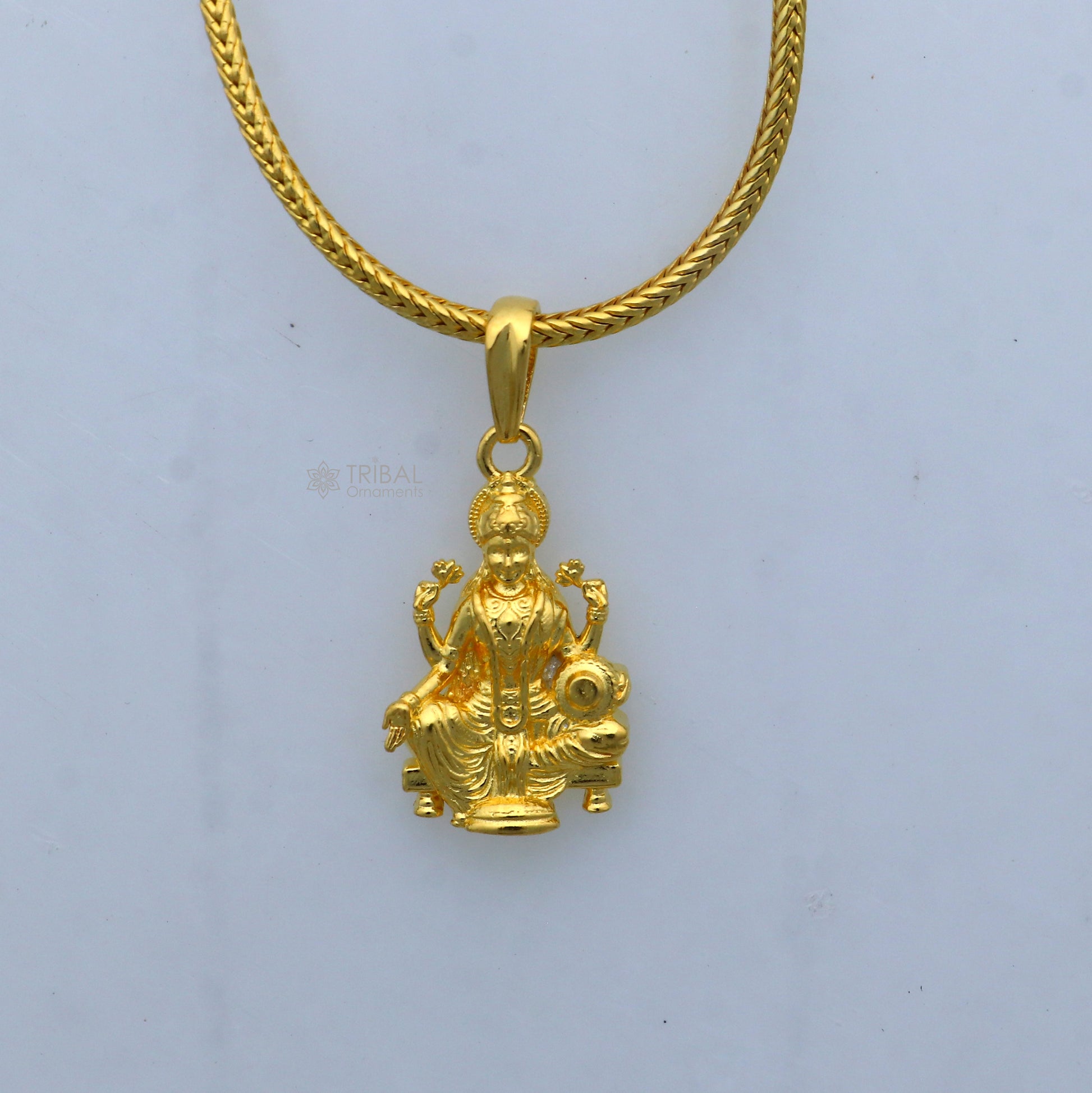925 sterling silver gold-polished Lord Maha Laxmi Ji pendant with intricate divine design, crafted by TRIBAL ORNAMENTS.