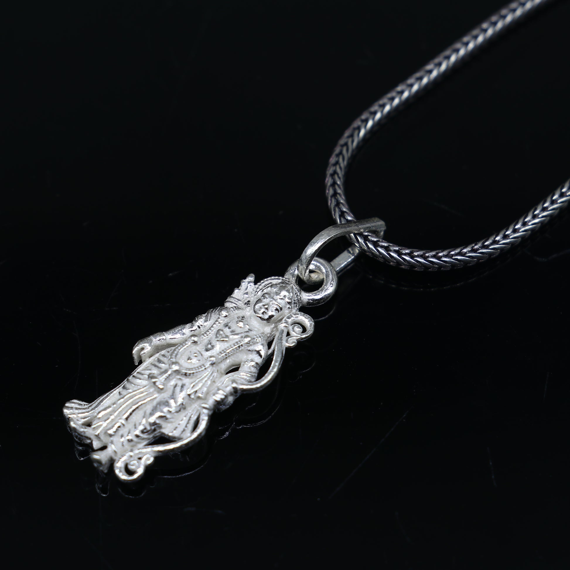 925 sterling silver Lord Ram divine pendant with gold polish from TRIBAL ORNAMENTS, featuring intricate design and religious symbolism.