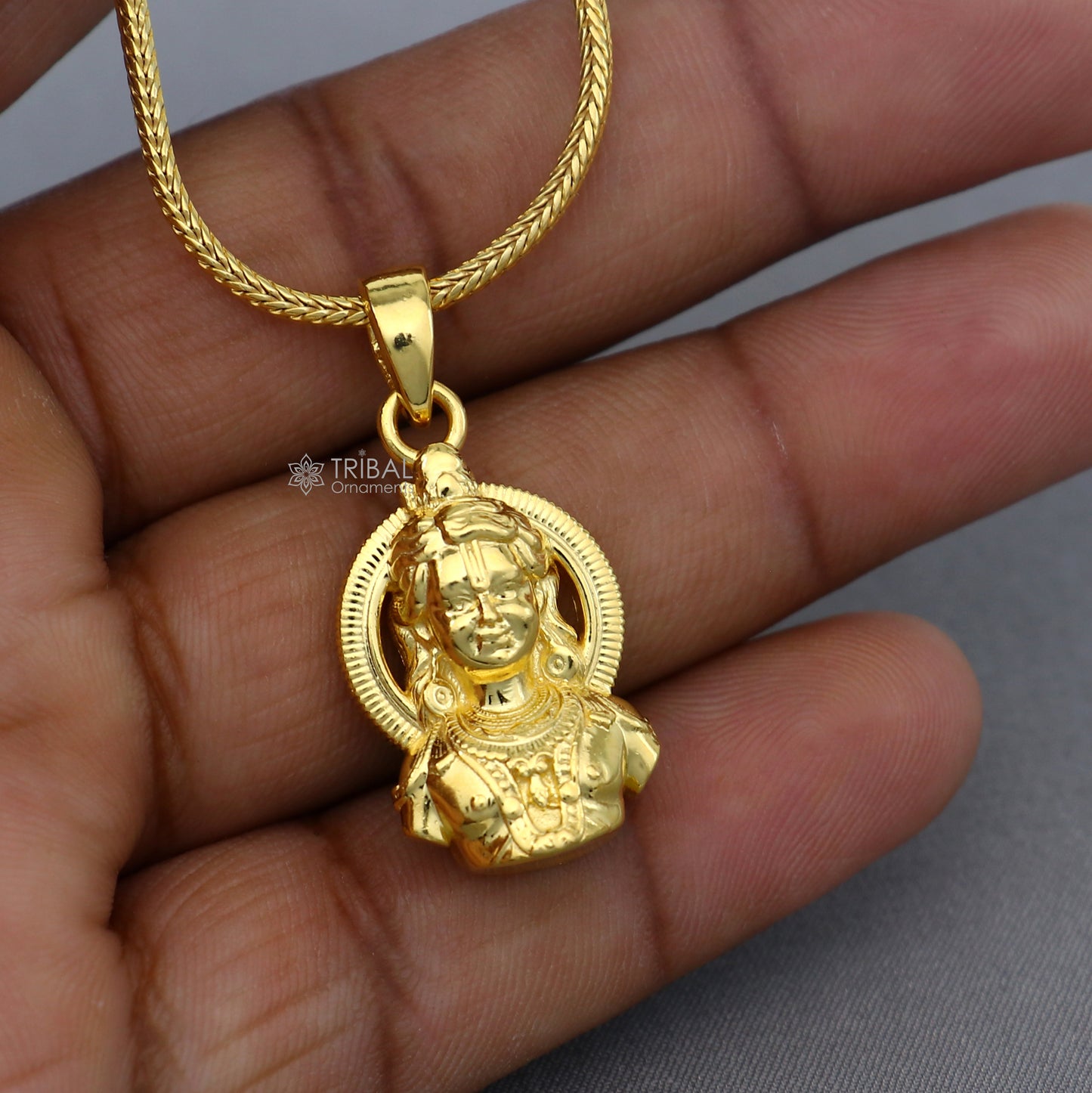 Sterling silver gold-polished Lord Rama Lalla pendant, divine religious jewelry, detailed deity design, from Tribal Ornaments.