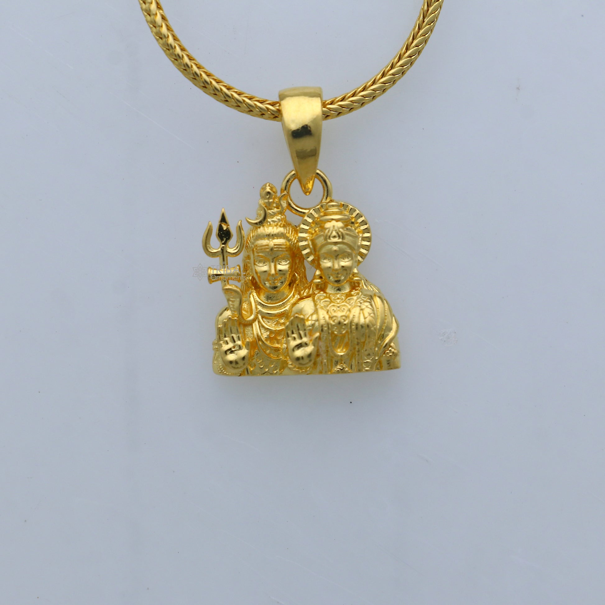 Sterling silver gold-polished Lord Shiva and Parwati Maa pendant, divine religious jewelry by TRIBAL ORNAMENTS.