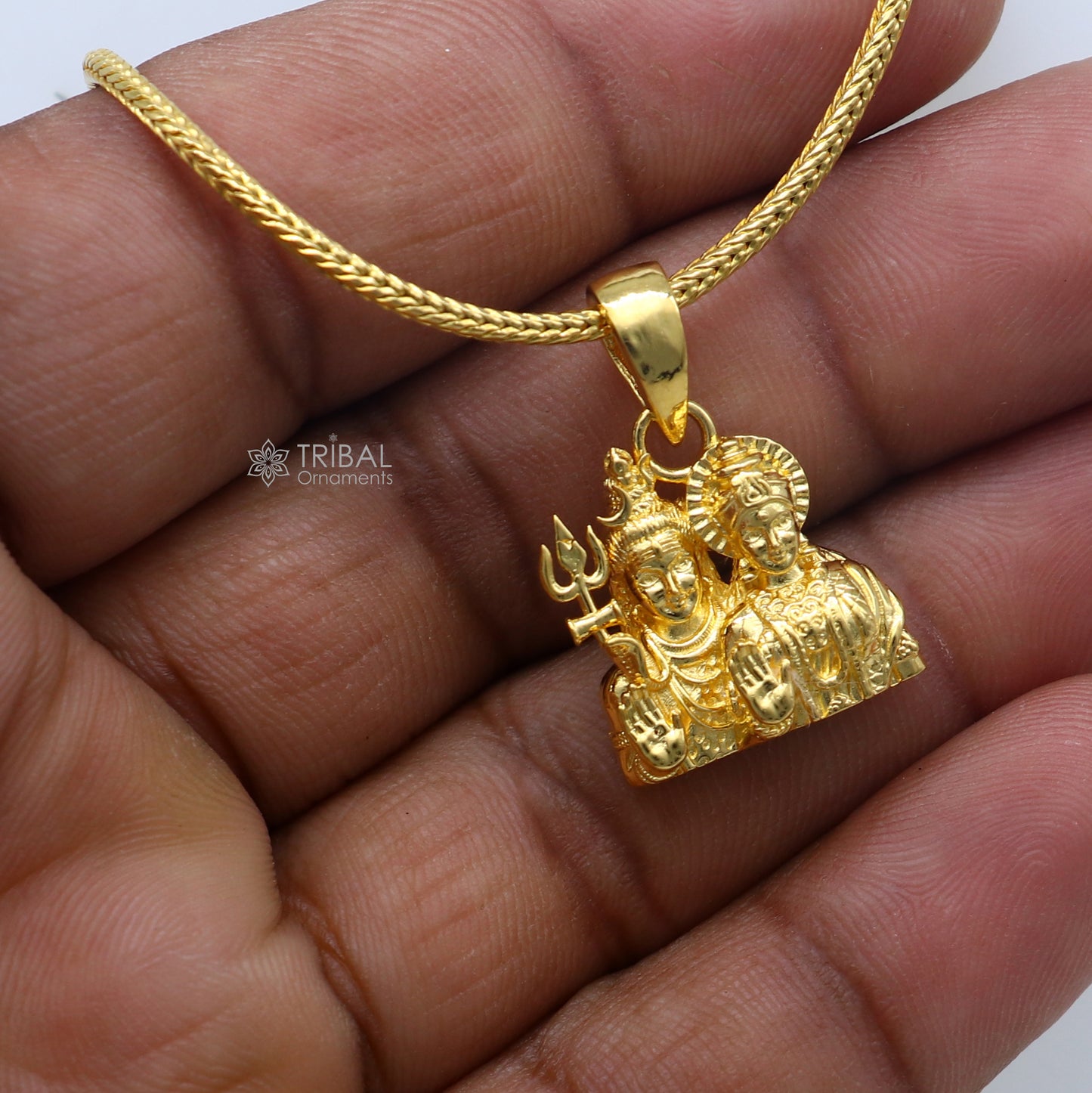 925 silver gold-polished Lord Shiva and Parwati Maa divine pendant, crafted by TRIBAL ORNAMENTS, featuring intricate religious symbols.